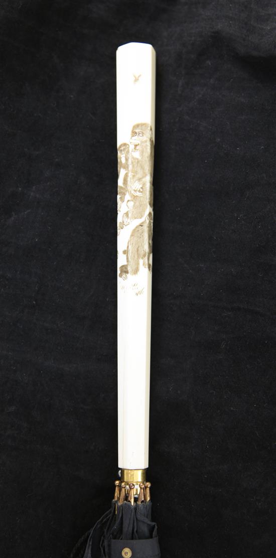 An early 20th century parasol with Japanese ivory handle, overall 33.5in.